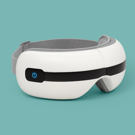 Smart eye massager with built-in controls resting on a table, showing soft lining and adjustable strap