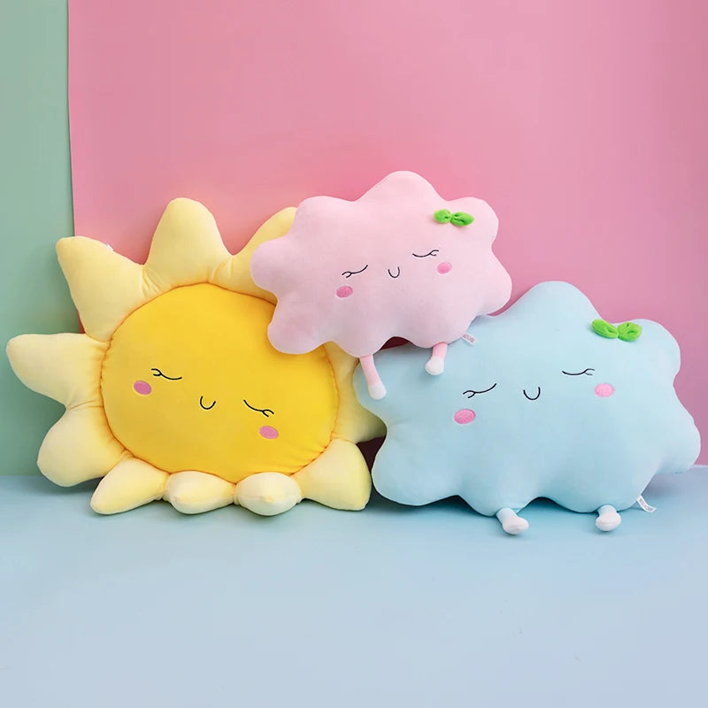 Plush flower and heart-shaped pillows arranged on a pastel bed setup