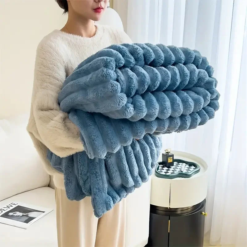 Ultra soft velvet blanket folded on a bed, showcasing thick plush texture and cozy feel