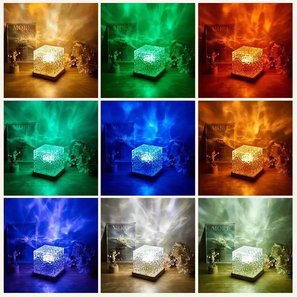 Northern lights projector casting green and blue aurora effects with stars on a dark ceiling