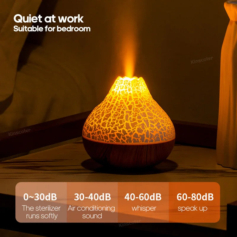Volcano diffuser with glowing lava-like light and mist on a tabletop