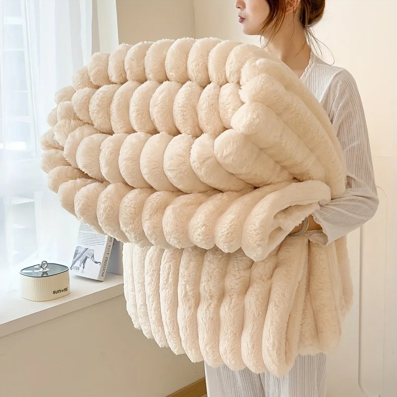 Ultra soft velvet blanket folded on a bed, showcasing thick plush texture and cozy feel