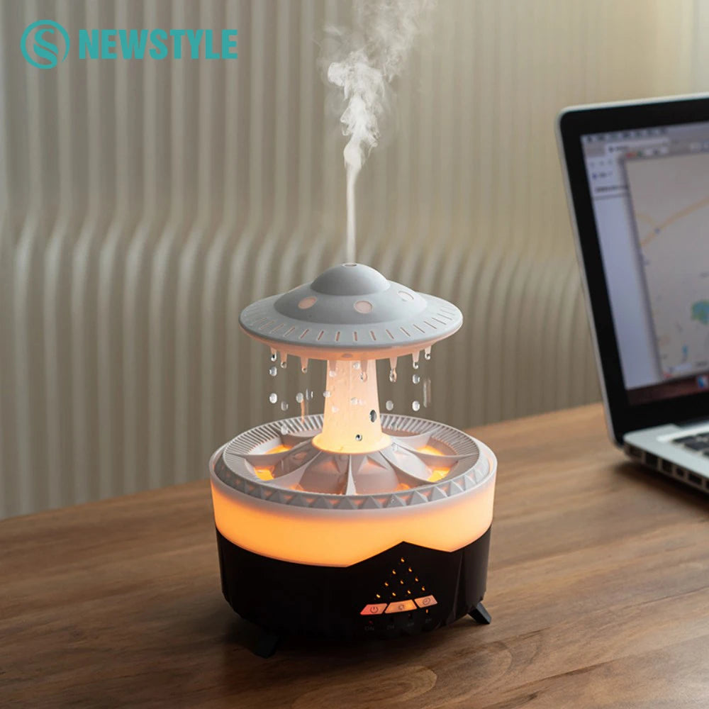 UFO-shaped night light humidifier glowing softly and emitting mist on a bedside table