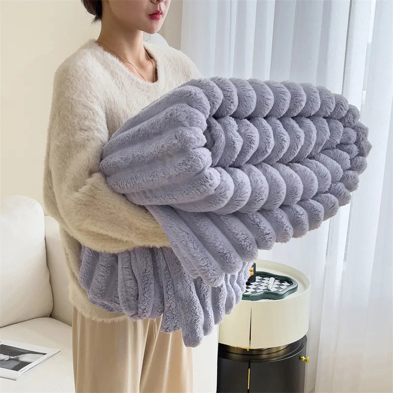 Ultra soft velvet blanket folded on a bed, showcasing thick plush texture and cozy feel