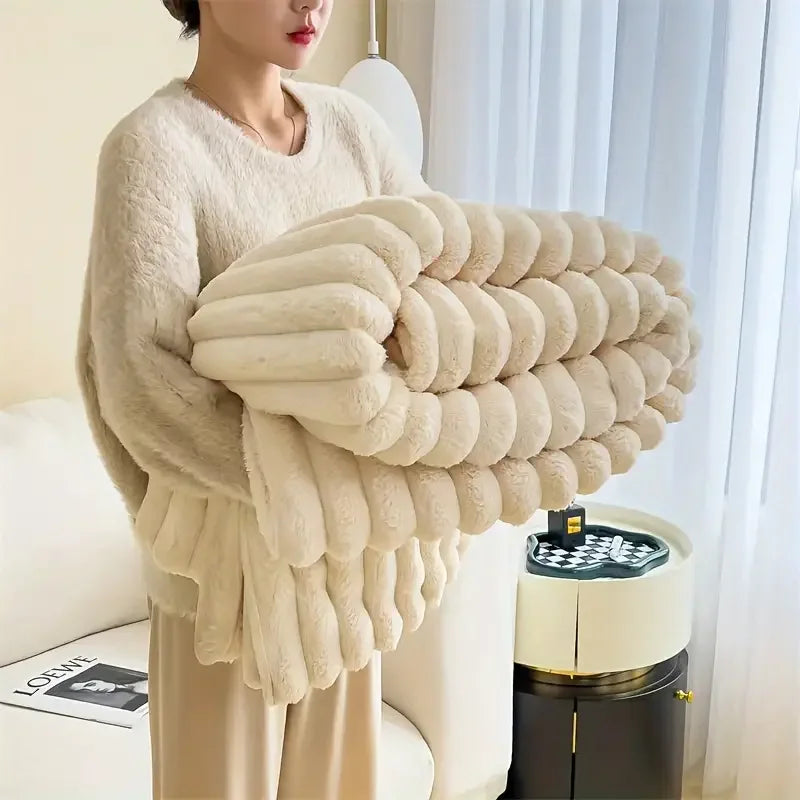 Ultra soft velvet blanket folded on a bed, showcasing thick plush texture and cozy feel
