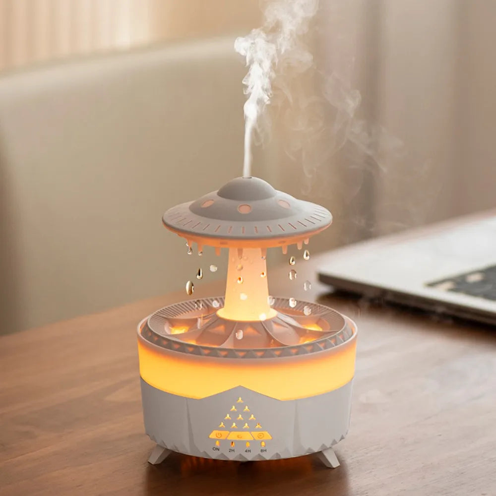 UFO-shaped night light humidifier glowing softly and emitting mist on a bedside table
