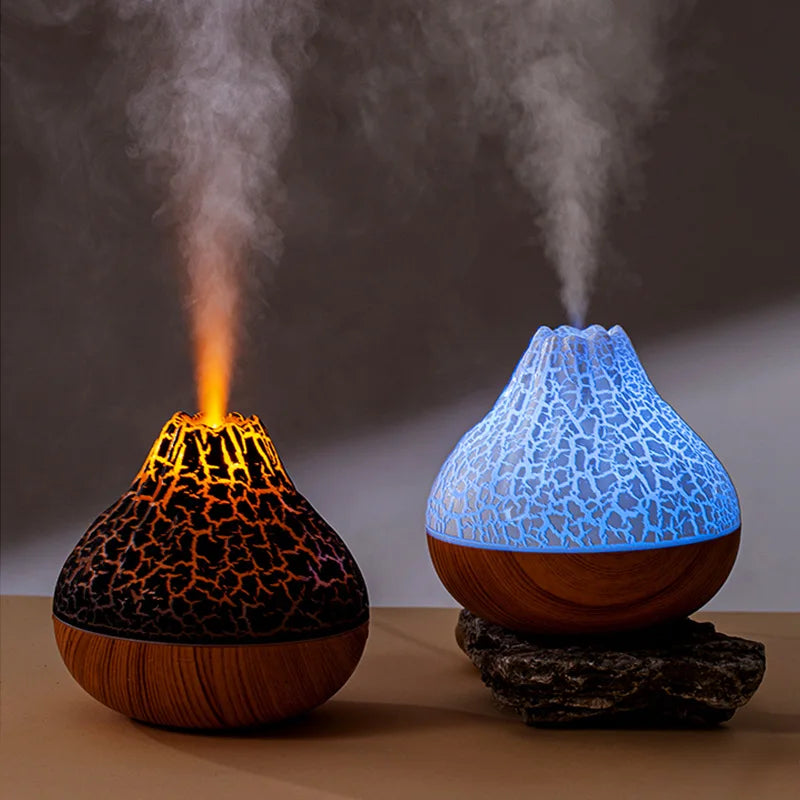 Volcano diffuser with glowing lava-like light and mist on a tabletop