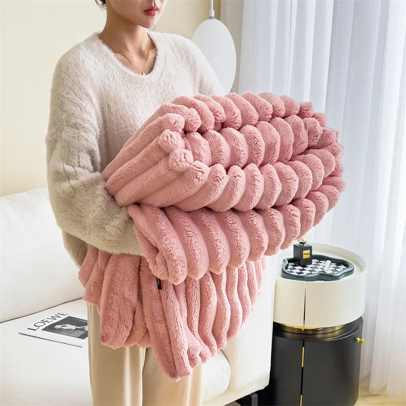 Ultra soft velvet blanket folded on a bed, showcasing thick plush texture and cozy feel