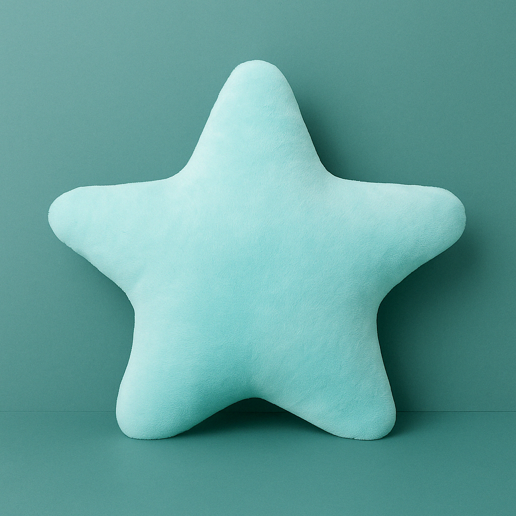 Soft star-shaped plush pillow in pastel color resting on a cozy bed or sofa

