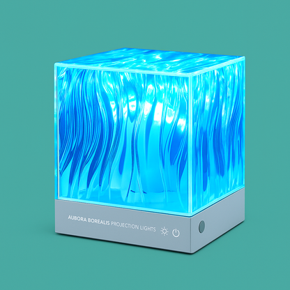 Northern lights projector casting green and blue aurora effects with stars on a dark ceiling
