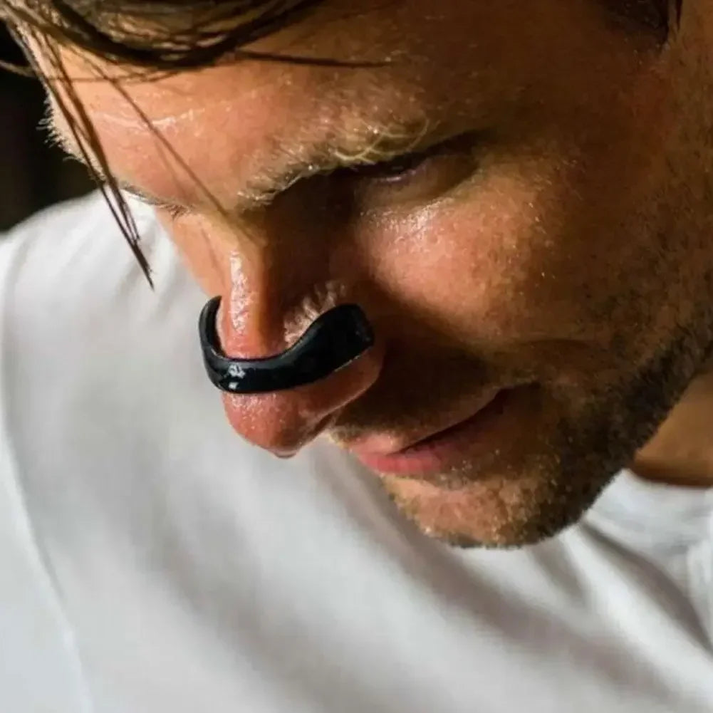 Set of magnetic nasal dilators in storage case, arranged neatly on a white background
