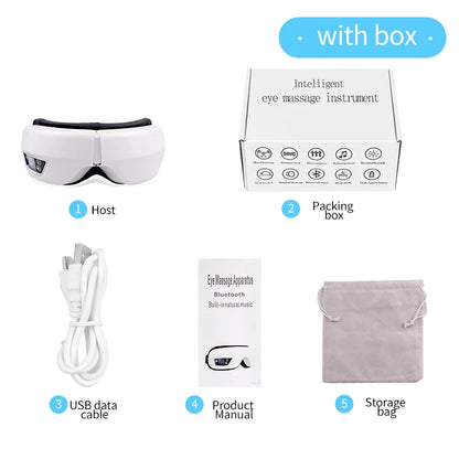 Smart eye massager with built-in controls resting on a table, showing soft lining and adjustable strap
